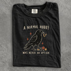 A Normal Hobby Was Never an Option Crow Comfort Colors T-Shirt