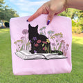Black Cat Book in the Garden T-Shirt