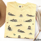 Swimming Otters Comfort Colors T-Shirt - Butter / S - T-Shirt