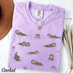 Swimming Otters Comfort Colors T-Shirt - Orchid / S - T-Shirt