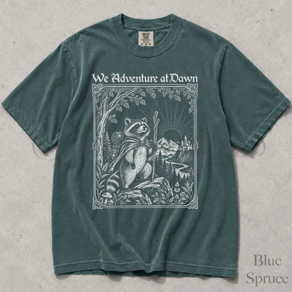 We Adventure at Dawn Hiking Raccoon Comfort Colors T-Shirt - Blue Spruce / S - T-Shirt